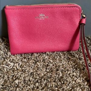 Never used!  Pink coach wristlet